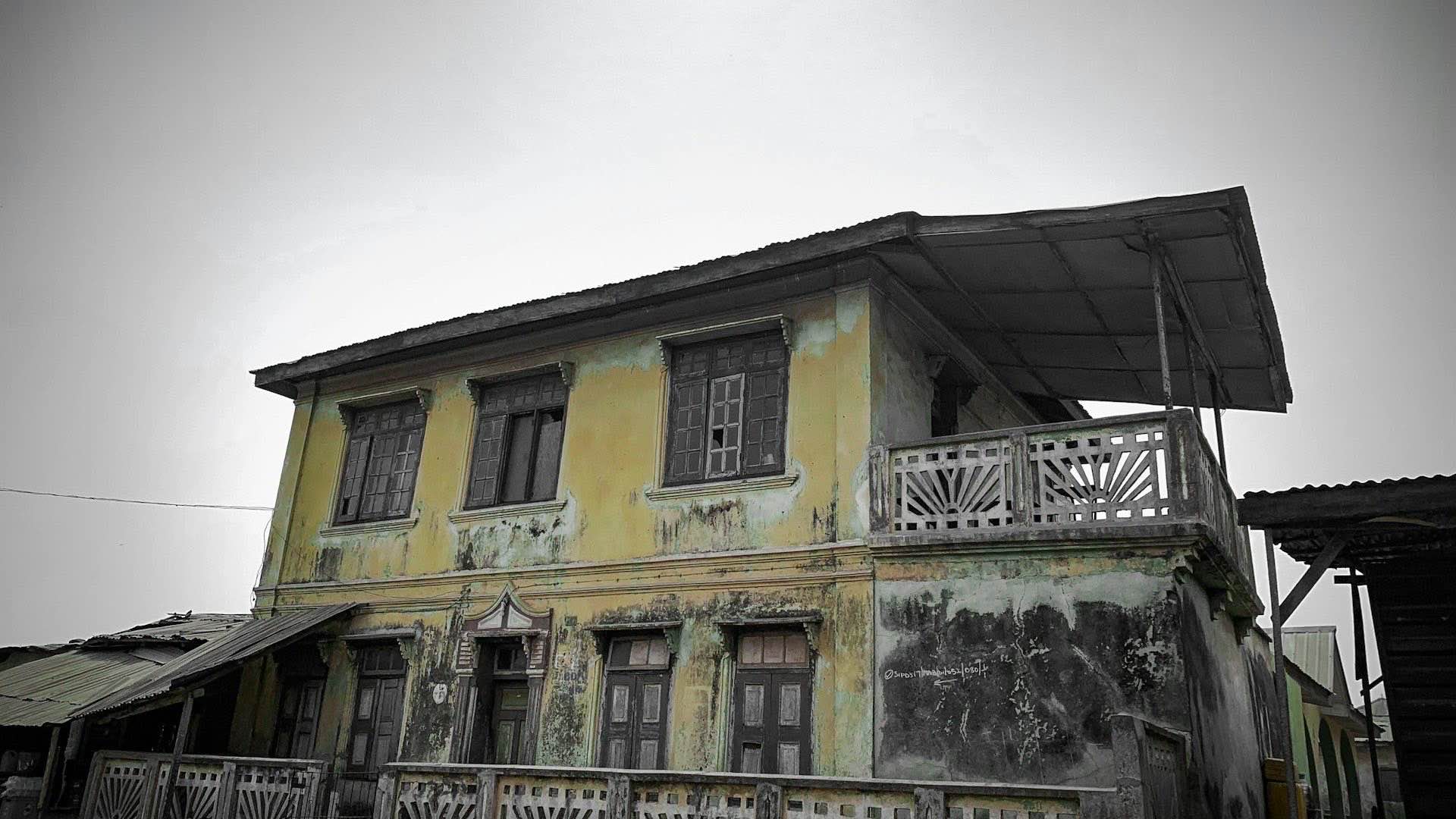 Older East Texas home at dusk representing an inherited-property situation